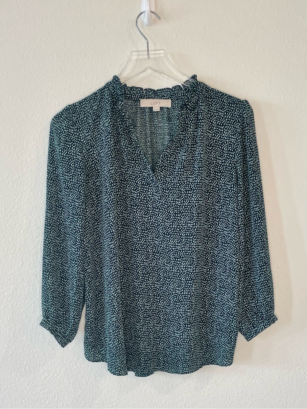 LOFT ruffled V-neck top in navy blue with green polka dots and 3/4 sleeves